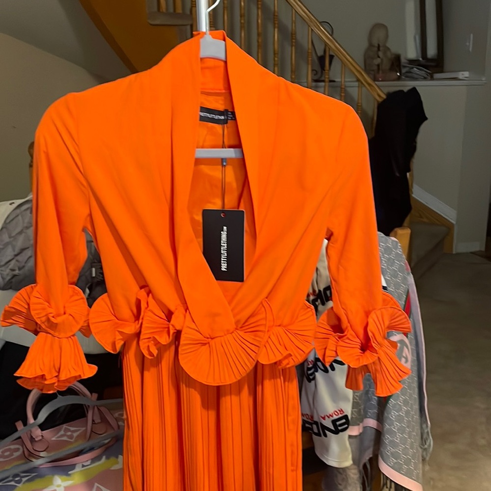 Brand New Prettylittlethings orange coral dress this dress retails for $350